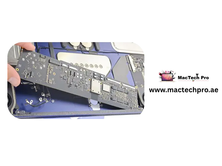 Component-level micro-soldering on an iMac logic board under a microscope in Dubai — MacTech Pro
