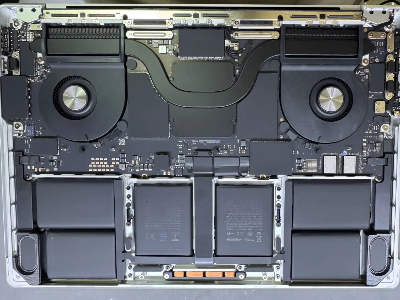 Component-level micro-soldering on a water-damaged Mac board in Dubai by MacTech Pro